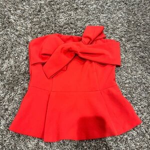 Adelyn Rae Red Asymmetrical Peplum Blouse